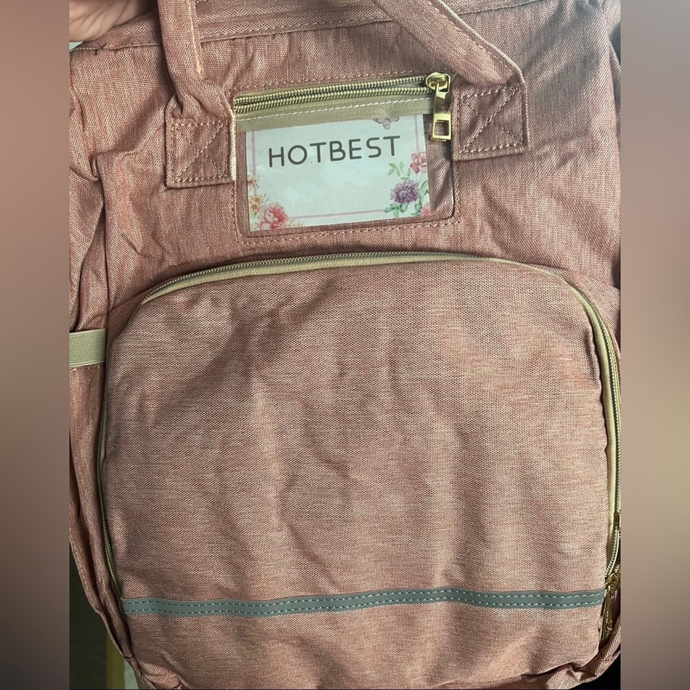 Large pink diaper bag.